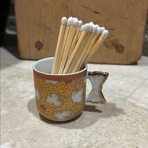 Ceramic Miniature Teacup with Bow Handle turned Match Striker Match Holder